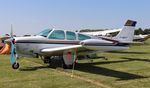 C-GBXT @ KOSH - Beech F33A - by Mark Pasqualino