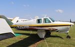 N3439B @ KOSH - Beech D35 - by Mark Pasqualino