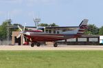 N999KM @ KOSH - Cessna P210N - by Mark Pasqualino