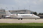 N303JJ @ KRSW - Learjet 303JJ taxis at Southwest Florida International Airport prior to flight to Centennial Airport - by Suncoast Spotter