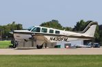 N430FM @ KOSH - Raytheon A36 - by Mark Pasqualino