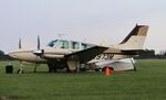 N7973M @ KOSH - Beech C55 - by Mark Pasqualino