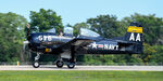 N228TS @ KOSH - Landing after a T-28 group flight - by Topgunphotography