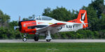 N7160C @ KOSH - Landing after Group flyover - by Topgunphotography