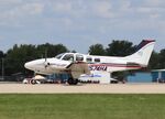 N574HA @ KOSH - Beech 58