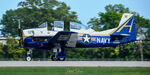 N289RD @ KOSH - Touching down after Group T-28 flight - by Topgunphotography