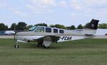 C-FCAH @ KOSH - Beech 36 - by Mark Pasqualino