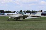 N1742G @ KOSH - Beech B33 - by Mark Pasqualino