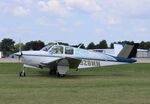 N928MM @ KOSH - Beech V35A - by Mark Pasqualino