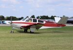 N7713R @ KOSH - Beech V35A - by Mark Pasqualino