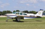 N831R @ KOSH - Beech 33 - by Mark Pasqualino