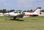 N7821R @ KOSH - Beech B55 - by Mark Pasqualino