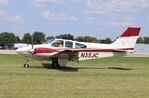N35JC @ KOSH - Beech B55 - by Mark Pasqualino