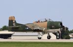 N51705 @ KOSH - North American T-28D - by Mark Pasqualino