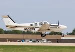 N533PM @ KOSH - Beech G58