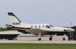 N138MA @ KOSH - Socata TBM 700 - by Mark Pasqualino