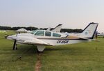 LV-HGK @ KOSH - Beech E55 - by Mark Pasqualino
