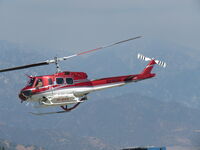 N216GH @ 1938 - Turning northbound to the fire - by 30295