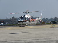 N614HH @ 1938 - Headed back to fire area - by 30295
