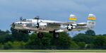 N27493 @ KOSH - Miss Mitchell landing at KOSH - by Topgunphotography