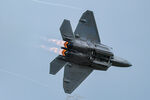02-4034 @ KOSH - Raptor Demo with the weapons bay flash at show center - by Topgunphotography