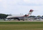 N350PD @ KOSH - Bombardier BD-100-1A10 - by Mark Pasqualino