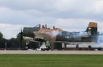 N51705 @ KOSH - North American T-28D - by Mark Pasqualino