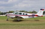 N333RE @ KOSH - Beech A36 - by Mark Pasqualino