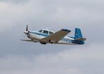 N333AG @ KOSH - Mooney M20E - by Mark Pasqualino