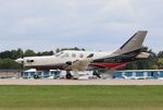 N900JV @ KOSH - Socata TBM-900 - by Mark Pasqualino
