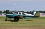 N423WT @ KOSH - Beech S35 - by Mark Pasqualino