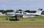 C-FWZN @ KOSH - Beech F33A - by Mark Pasqualino