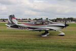 N1017H @ KOSH - Vans RV-10 - by Mark Pasqualino