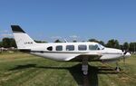 LV-MJS @ KOSH - Piper PA-31-310 - by Mark Pasqualino