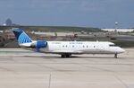 N915EV @ KORD - CL-600-2B19 - by Mark Pasqualino