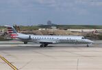 N670AE @ KORD - EMB-145LR