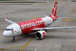 9M-AGA @ VTBD - Arriving at its gate: AirAsia A320N - by FerryPNL