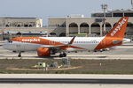 G-UZHY @ LMML - Park 9 - by Roberto Cassar