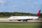 N918DU @ KTPA - Boeing 737-932/ER - by Mark Pasqualino