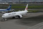 JA733J @ RJTT - B773 of JAL under tow to its gate - by FerryPNL