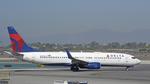 N374DA @ KLAX - Taxiing at LAX - by ToddRoyer