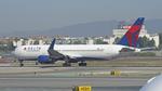 N394DL @ KLAX - Departing LAX on 24L - by ToddRoyer