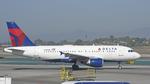 N338NB @ KLAX - Taxiing for departure at LAX - by ToddRoyer