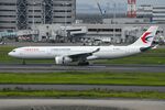 B-1049 @ RJTT - China Eastern A333 landing in HND - by FerryPNL