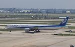 JA792A @ KORD - Boeing 777-381/ER