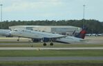 N123DW @ KMCO - Airbus A321-211 - by Mark Pasqualino