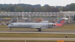 N716EV @ KIND - American Eagle CRJ7 - by AviationLover50