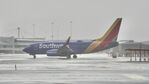 N7747C @ KSFO - Departing to the south. November rain 'Pineapple Express' SFO 2024. - by Clayton Eddy