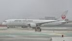 JA865J @ SFO - Departing south, November rain, 'Pineapple Express 2024. - by Clayton Eddy