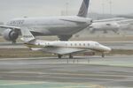 N560DR @ SFO - Departing runway 10, November rain, 'Pineapple Express' SFO 2024. - by Clayton Eddy
